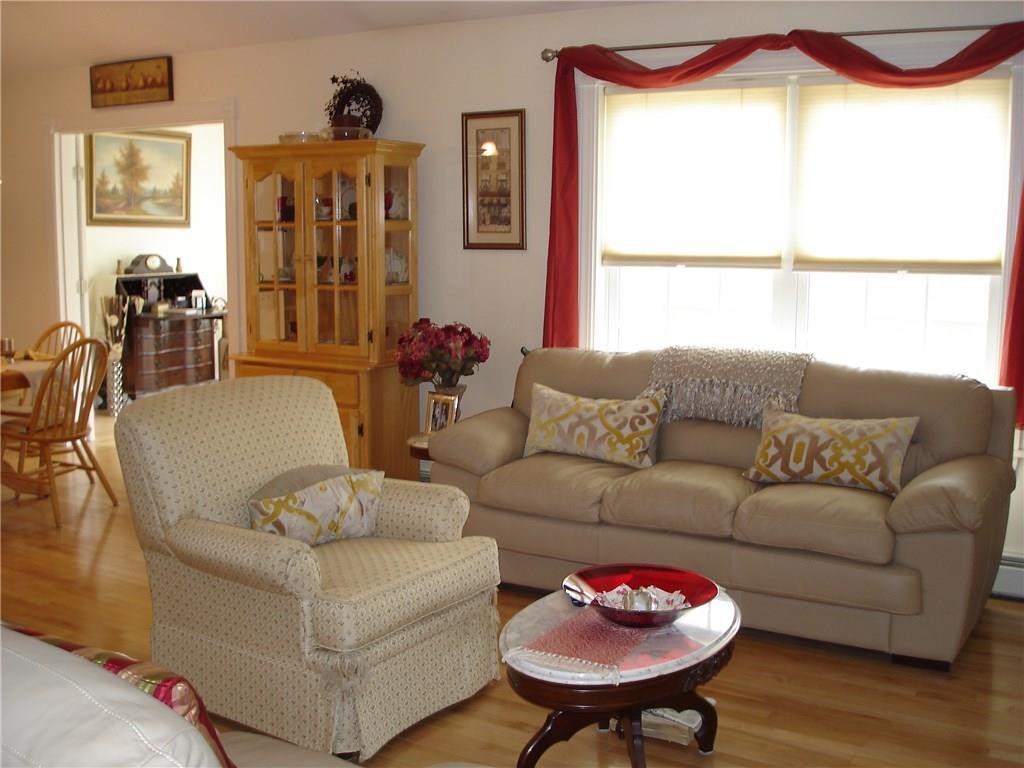 27 Highland Ridge Drive, Unit 27 Hampden, ME 04444 - Photo 12 of 32 Living Room!