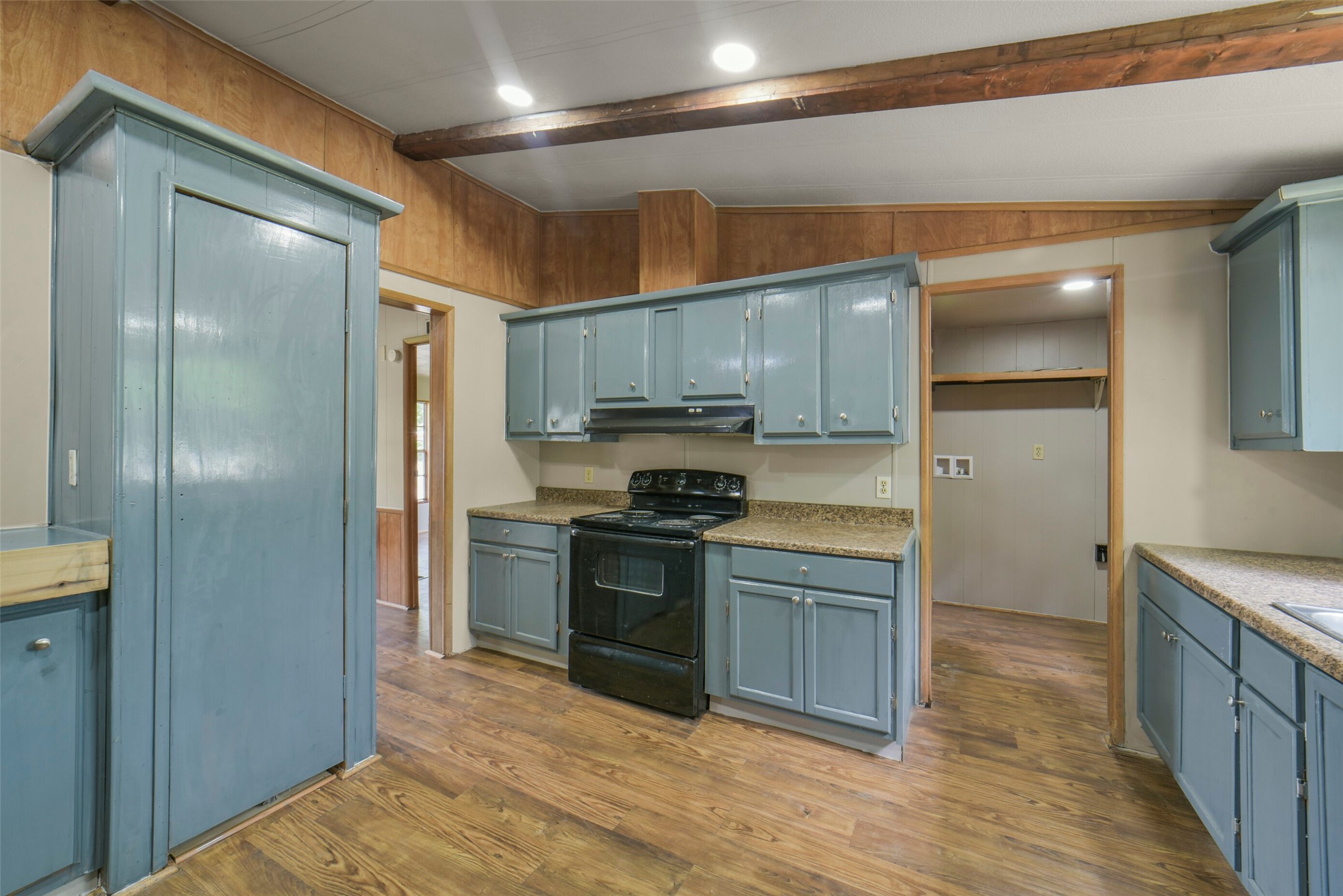 11023 Forrest Valley Drive Houston, TX 77065 - Photo 19 of 47 a kitchen with a refrigerator and a sink