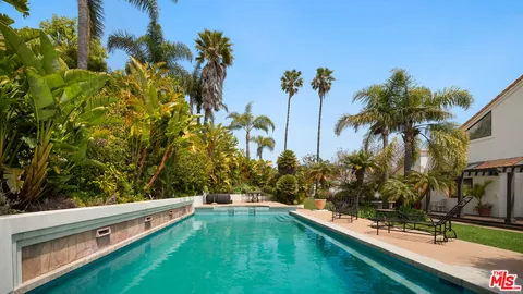 a view of an outdoor space and swimming pool
