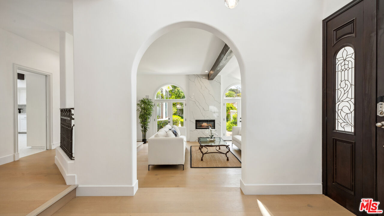 29675 Harvester Road Malibu, CA 90265 - Photo 7 of 36 a living room with furniture and a window