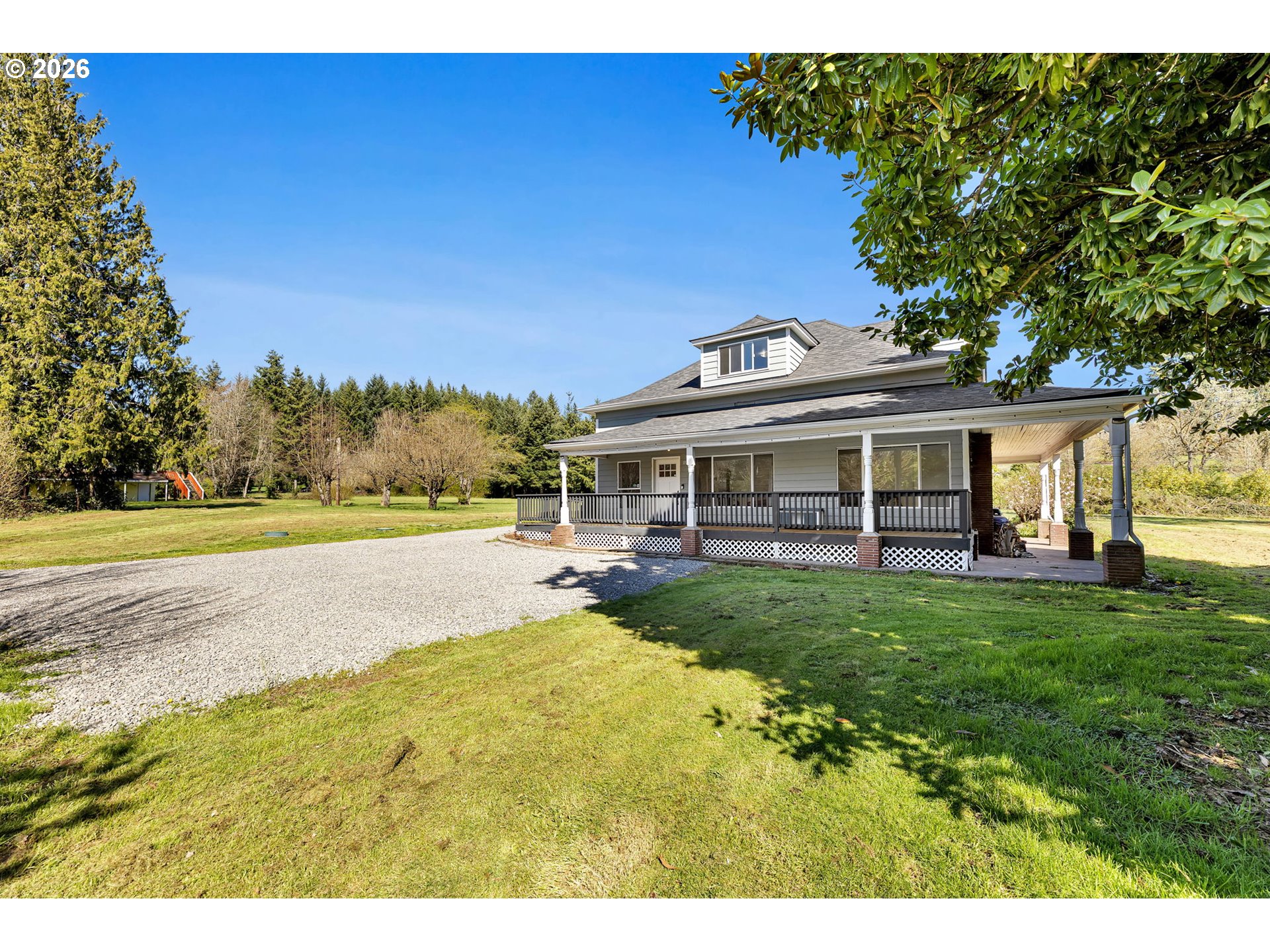 19905 Northeast 176th Avenue Battle Ground, WA 98604 - Photo 2 of 38 a view of a house with backyard and sitting area