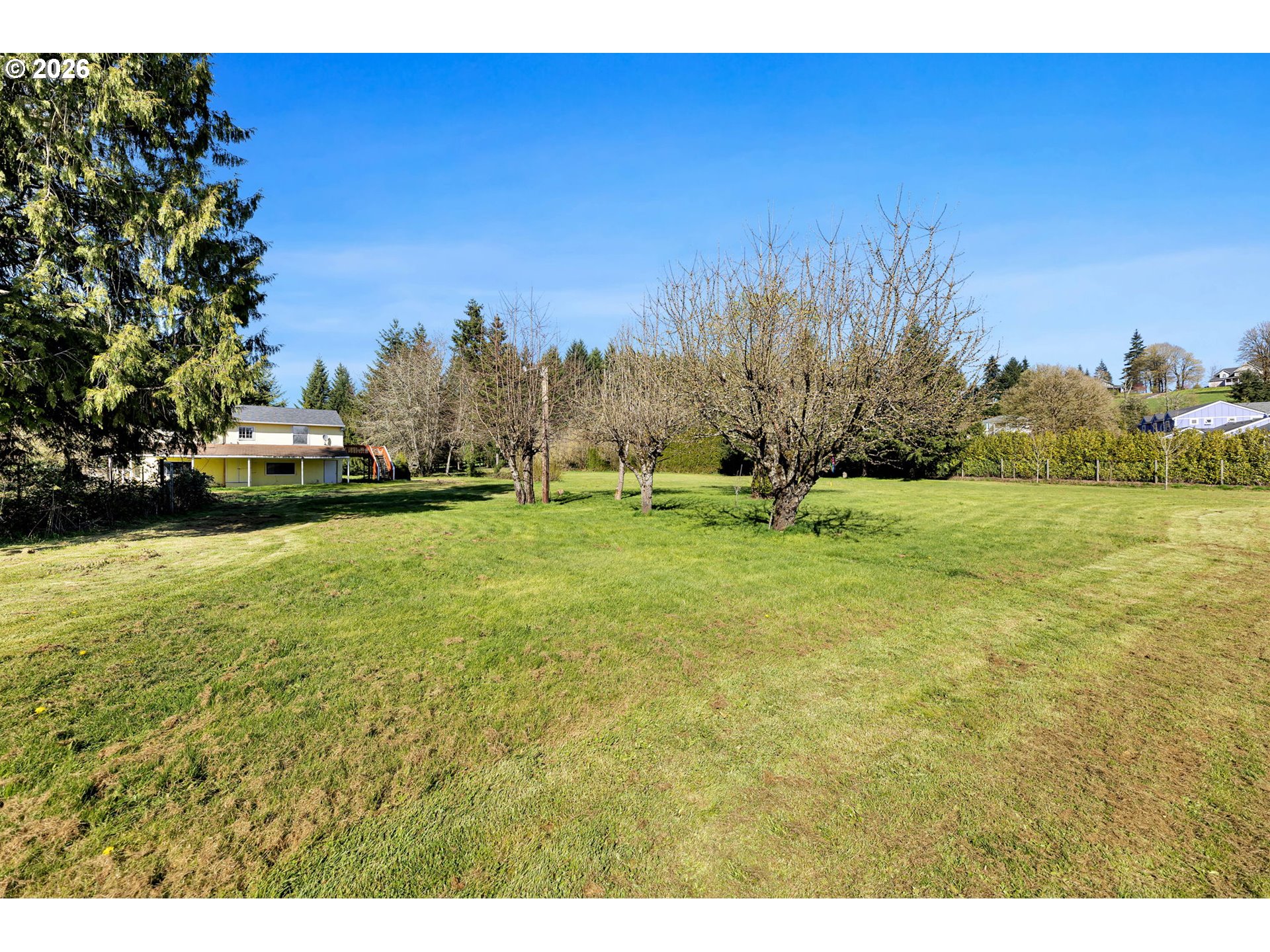 19905 Northeast 176th Avenue Battle Ground, WA 98604 - Photo 34 of 38 a view of outdoor space with deck and yard
