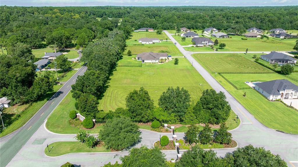 79 Southeast 79th Street Ocala, FL 34479 - Photo 1 of 11 a view of a swimming pool with a yard