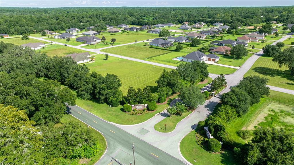 79 Southeast 79th Street Ocala, FL 34479 - Photo 11 of 11 a view of a swimming pool with a yard