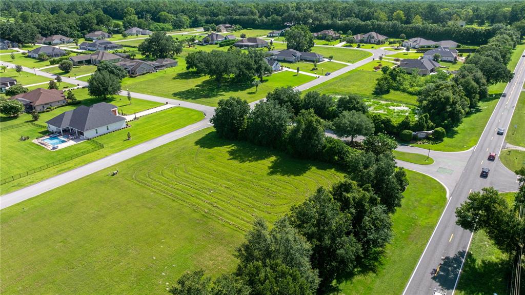 79 Southeast 79th Street Ocala, FL 34479 - Photo 6 of 11 a view of a houses with swimming pool and outdoor space