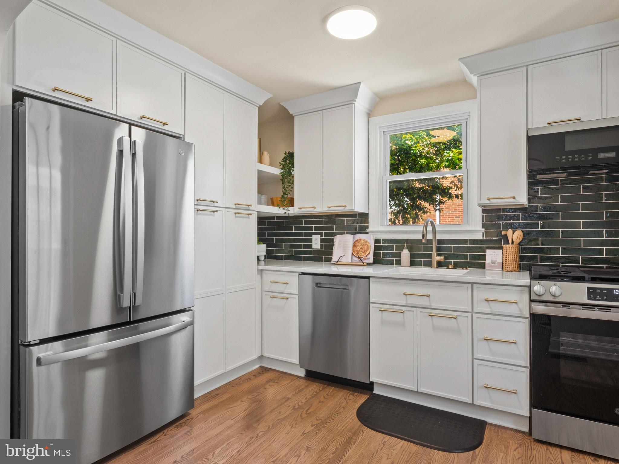 1003 Elm Ridge Avenue Baltimore, MD 21229 - Photo 9 of 40 Kitchen with stainless steel appliances