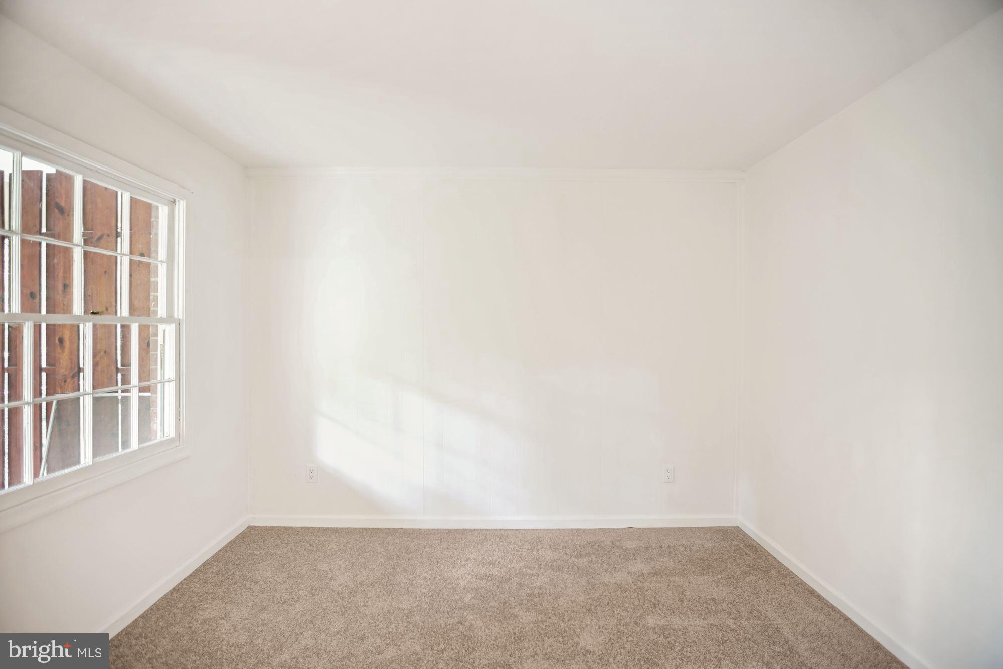 8112 Colony Point Road, Unit 231 Springfield, VA 22152 - Photo 14 of 30 Den has winow + view of wooded area