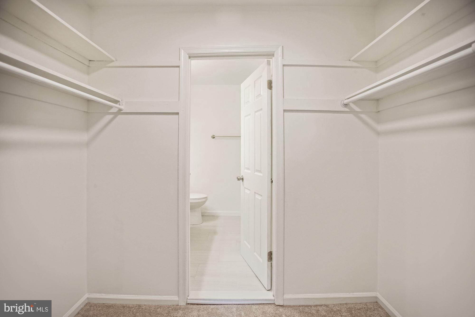 8112 Colony Point Road, Unit 231 Springfield, VA 22152 - Photo 21 of 30 Walk in MBR closet + custom shelves