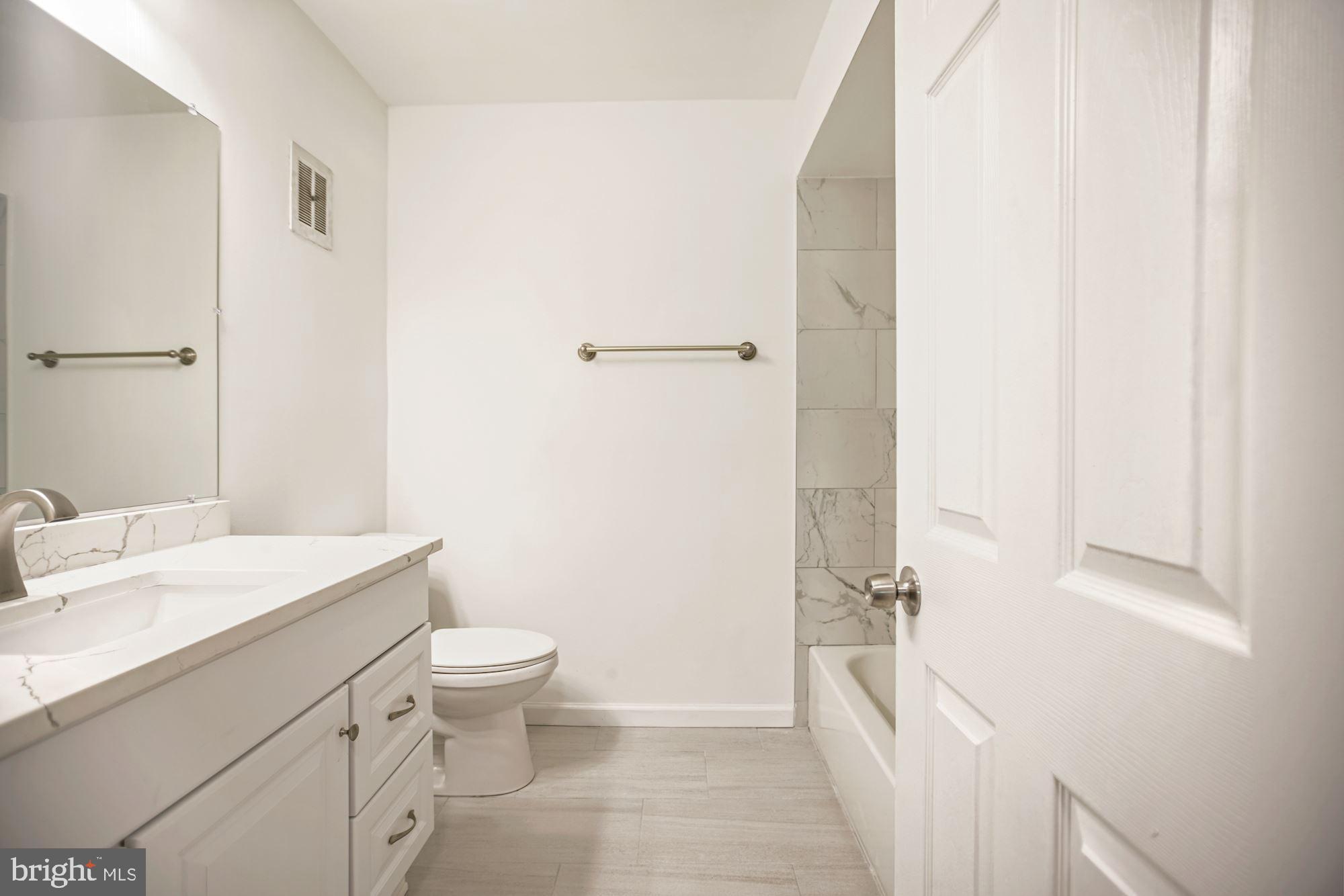 8112 Colony Point Road, Unit 231 Springfield, VA 22152 - Photo 23 of 30 MBR bath with tub/slower + new lighting/fixtures +