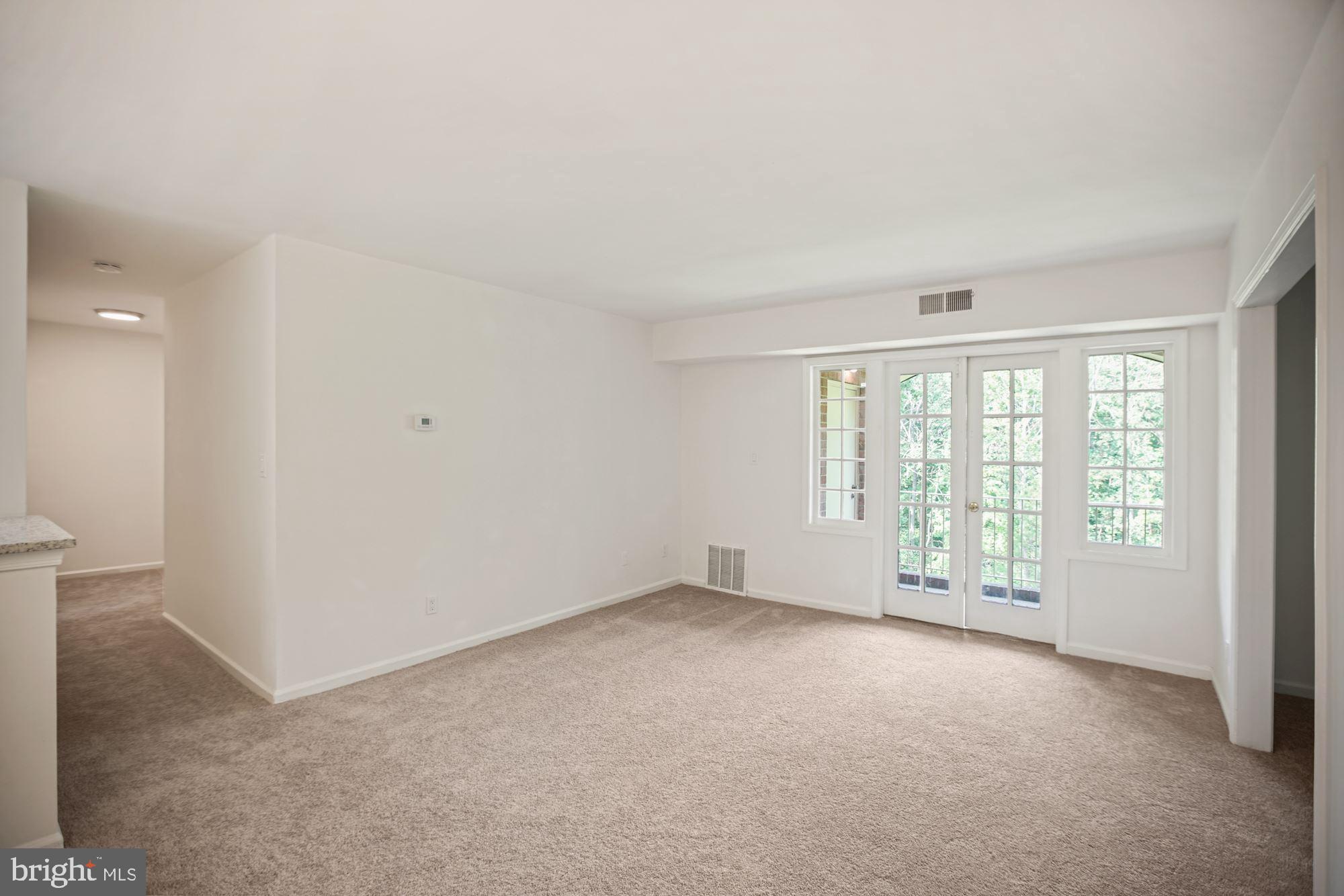 8112 Colony Point Road, Unit 231 Springfield, VA 22152 - Photo 10 of 30 Gracious living area with balcony