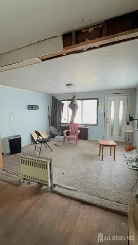 a view of a livingroom with furniture and a couch