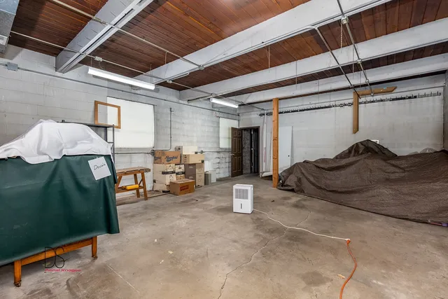 a view of a garage room and furniture