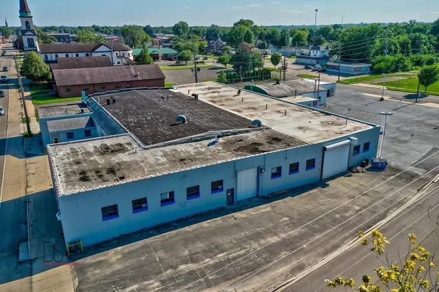 a view of a swimming pool with a lounge chair