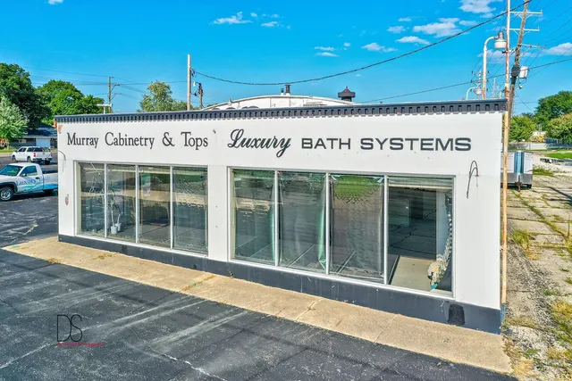 a view of a building with a window and an entrance