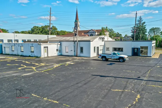 a view of a house with a street