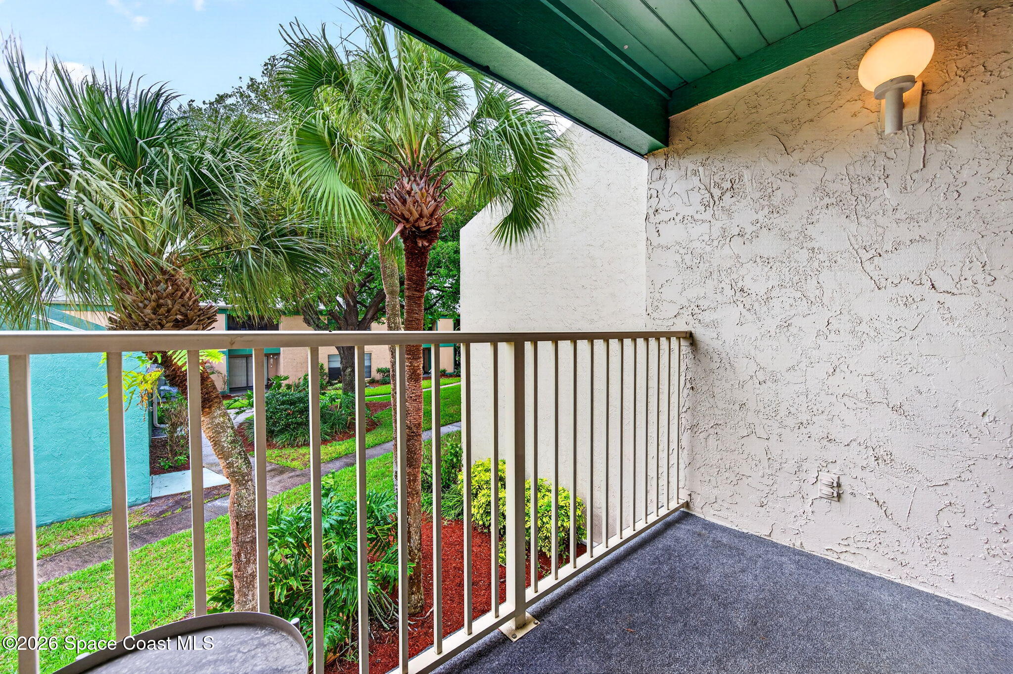 1225 North Wickham Road, Unit 422 Melbourne, FL 32935 - Photo 21 of 32 a view of a backyard