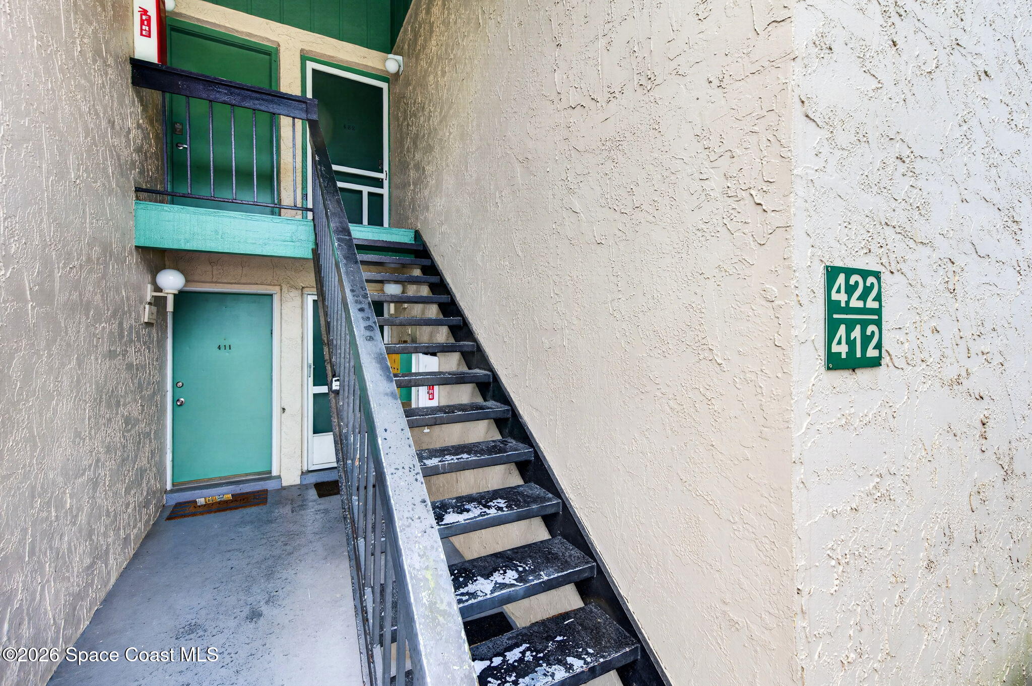 1225 North Wickham Road, Unit 422 Melbourne, FL 32935 - Photo 29 of 32 a view of an entryway with stairs
