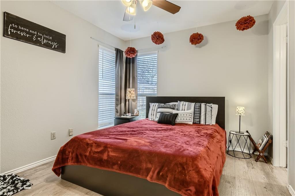 2126 Redwing Way Round Rock, TX 78664 - Photo 11 of 13 a bed sitting in a bedroom next to a window