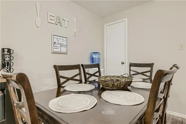 a view of a dining room with furniture