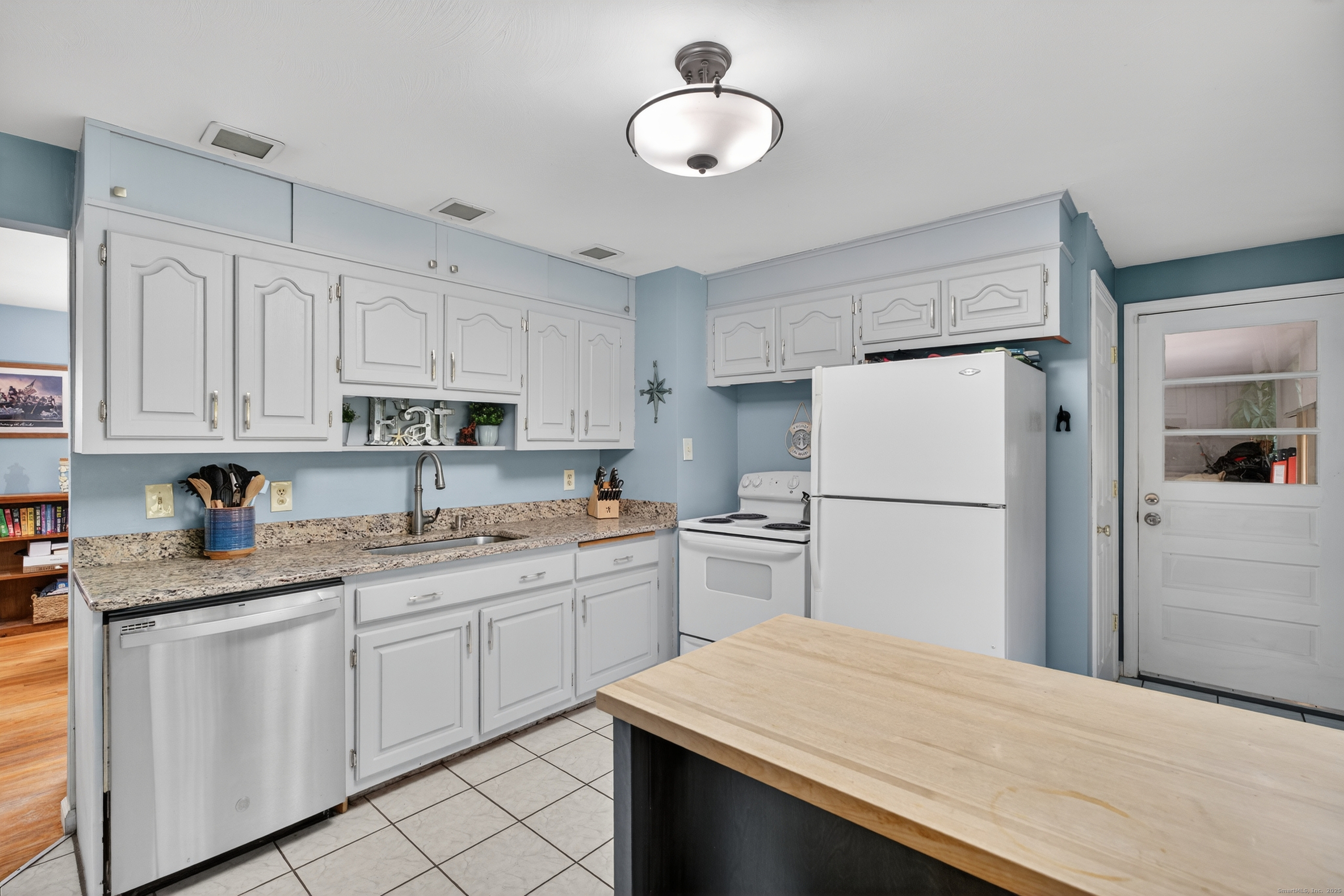 91 Highview Terrace Middletown, CT 06457 - Photo 18 of 39 a kitchen with white cabinets and white appliances
