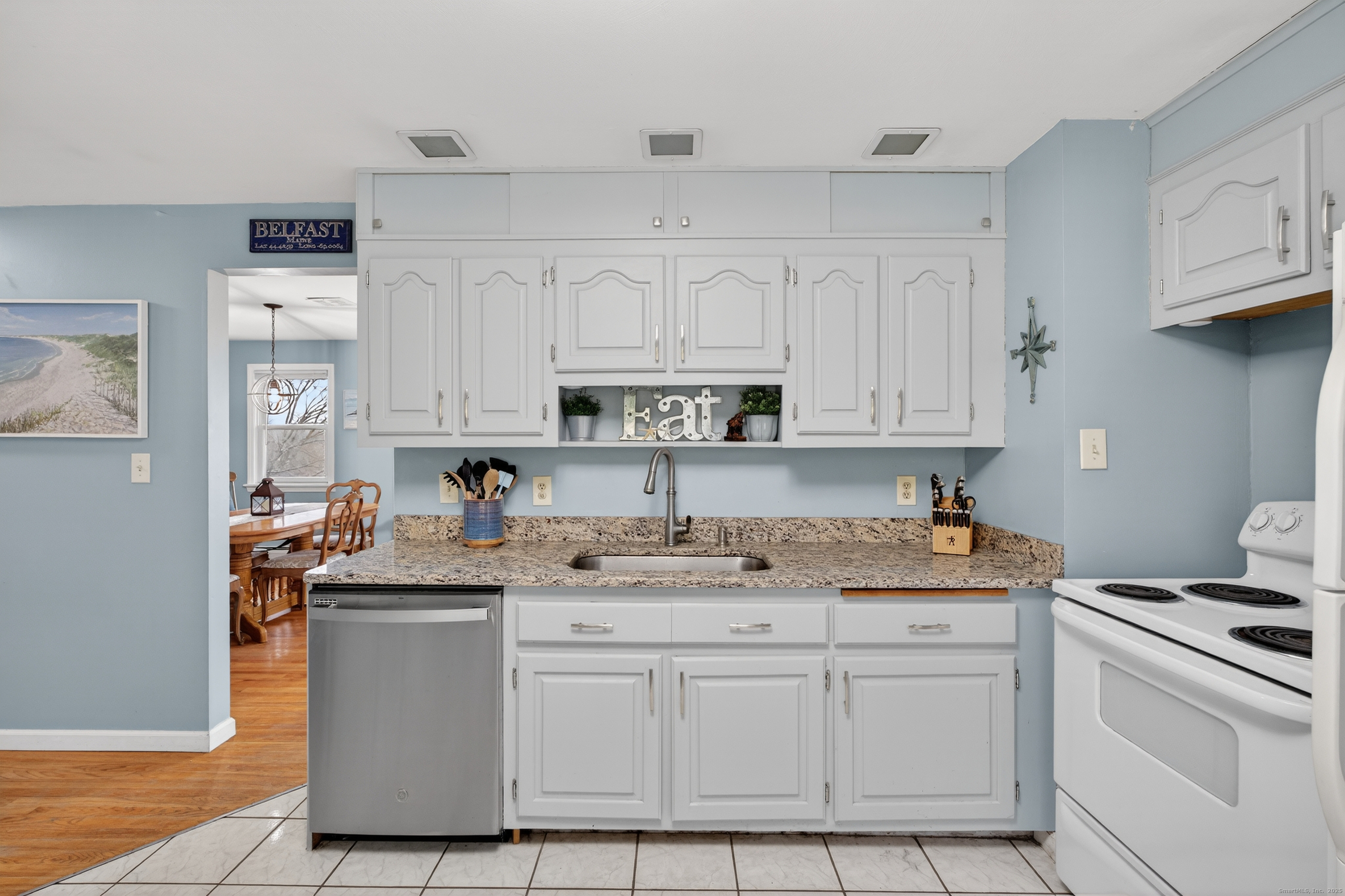 91 Highview Terrace Middletown, CT 06457 - Photo 20 of 39 a kitchen with stainless steel appliances granite countertop a sink stove and cabinets