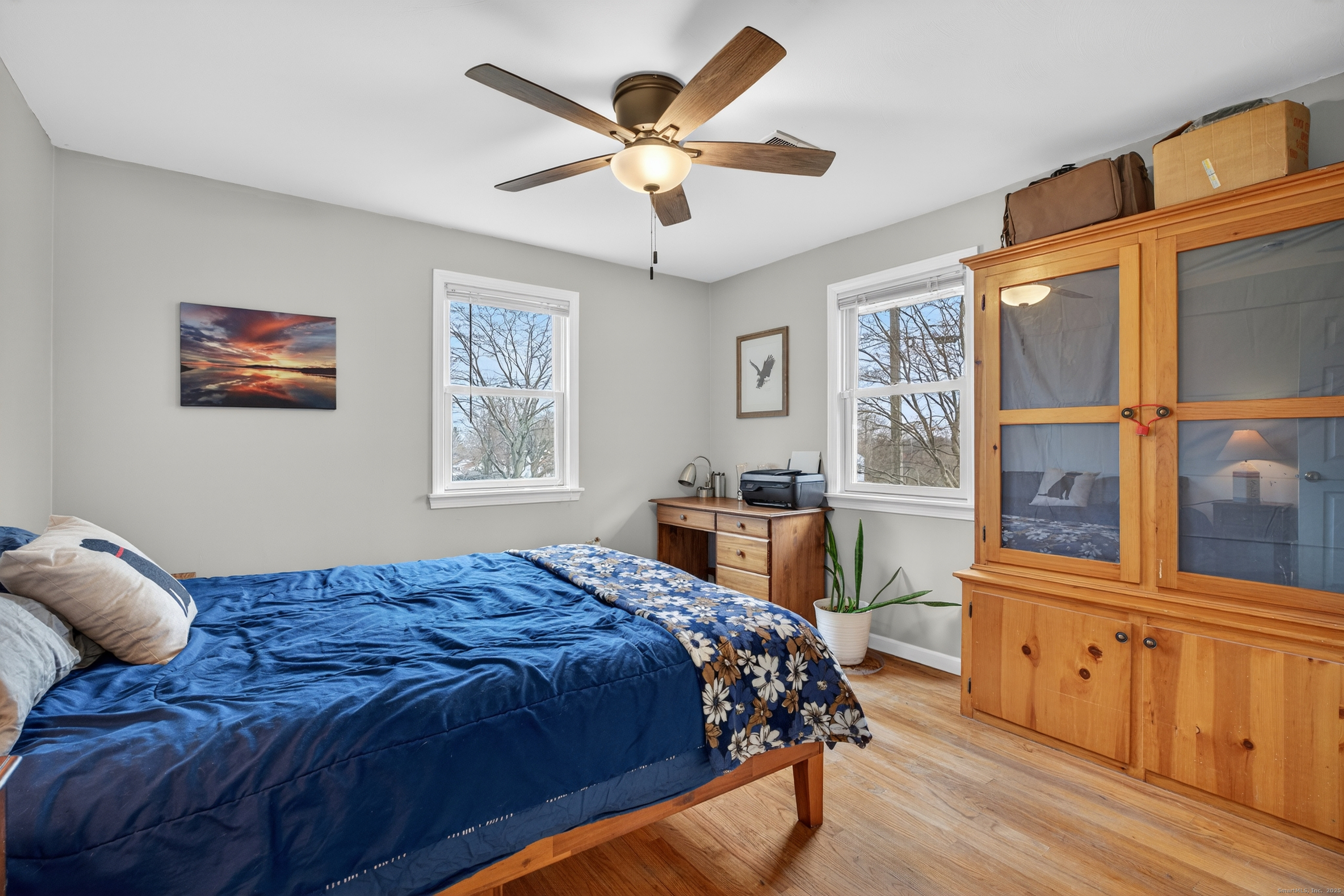 91 Highview Terrace Middletown, CT 06457 - Photo 23 of 39 a bedroom with a bed and a large window