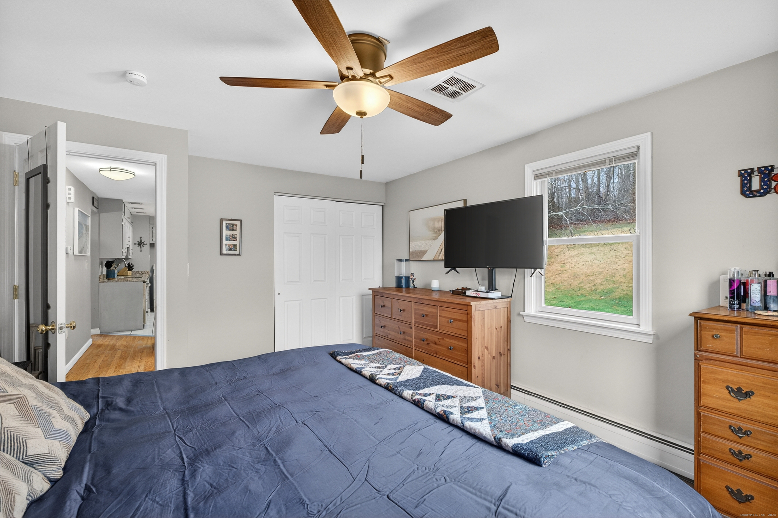 91 Highview Terrace Middletown, CT 06457 - Photo 28 of 39 a living room with furniture and a flat screen tv
