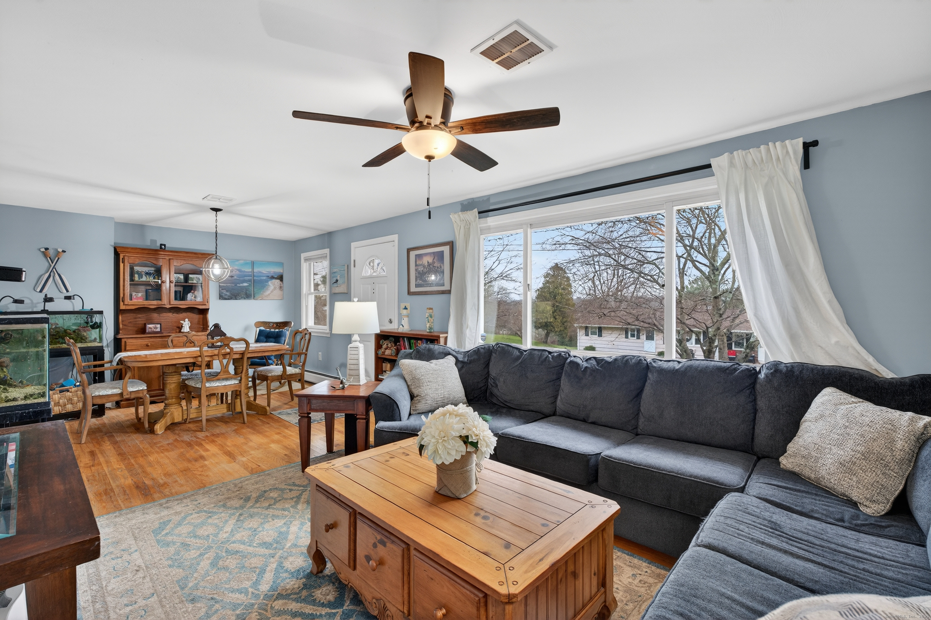 91 Highview Terrace Middletown, CT 06457 - Photo 6 of 39 a living room with furniture and a large window