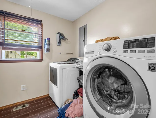 a utility room with dryer and washer