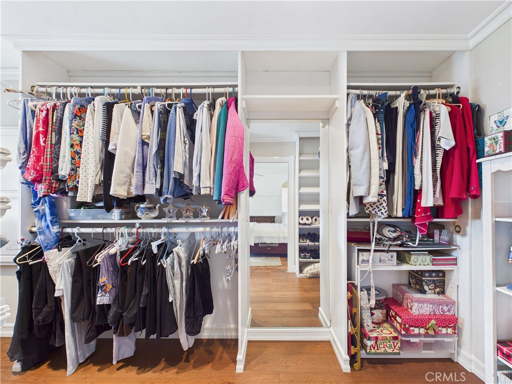 2857 Ellesmere Avenue Costa Mesa, CA 92626 - Photo 18 of 45 a view of walk in closet with clothes