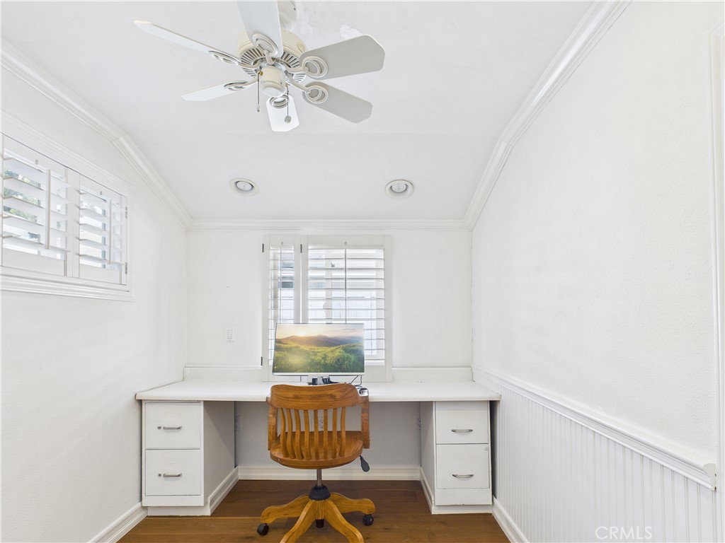 2857 Ellesmere Avenue Costa Mesa, CA 92626 - Photo 24 of 45 a living room with furniture and a table
