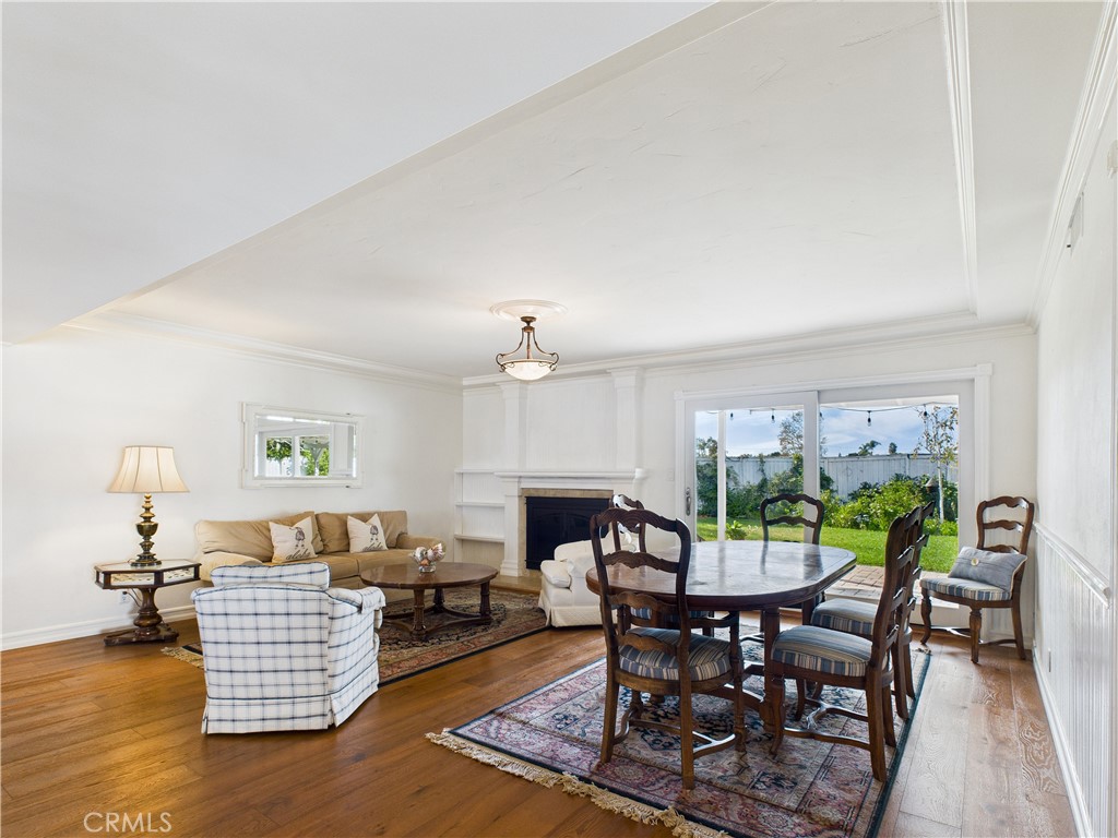 2857 Ellesmere Avenue Costa Mesa, CA 92626 - Photo 3 of 45 a living room with furniture and a wooden floor