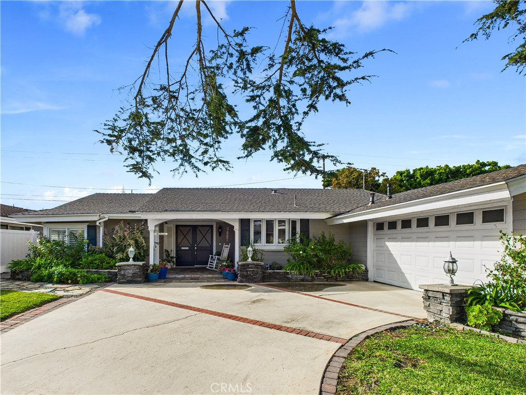 2857 Ellesmere Avenue Costa Mesa, CA 92626 - Photo 33 of 45 front view of a house with a yard
