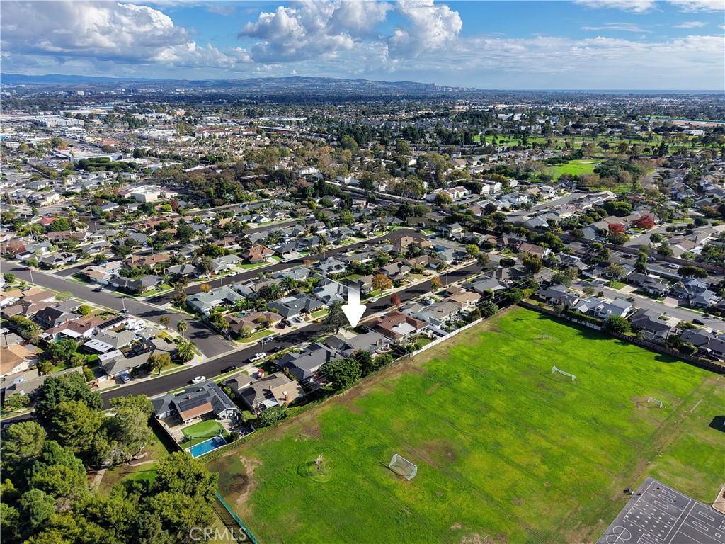2857 Ellesmere Avenue Costa Mesa, CA 92626 - Photo 40 of 45 an aerial view of residential houses with outdoor space