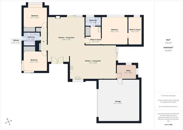 a living room with furniture a fireplace and a large window