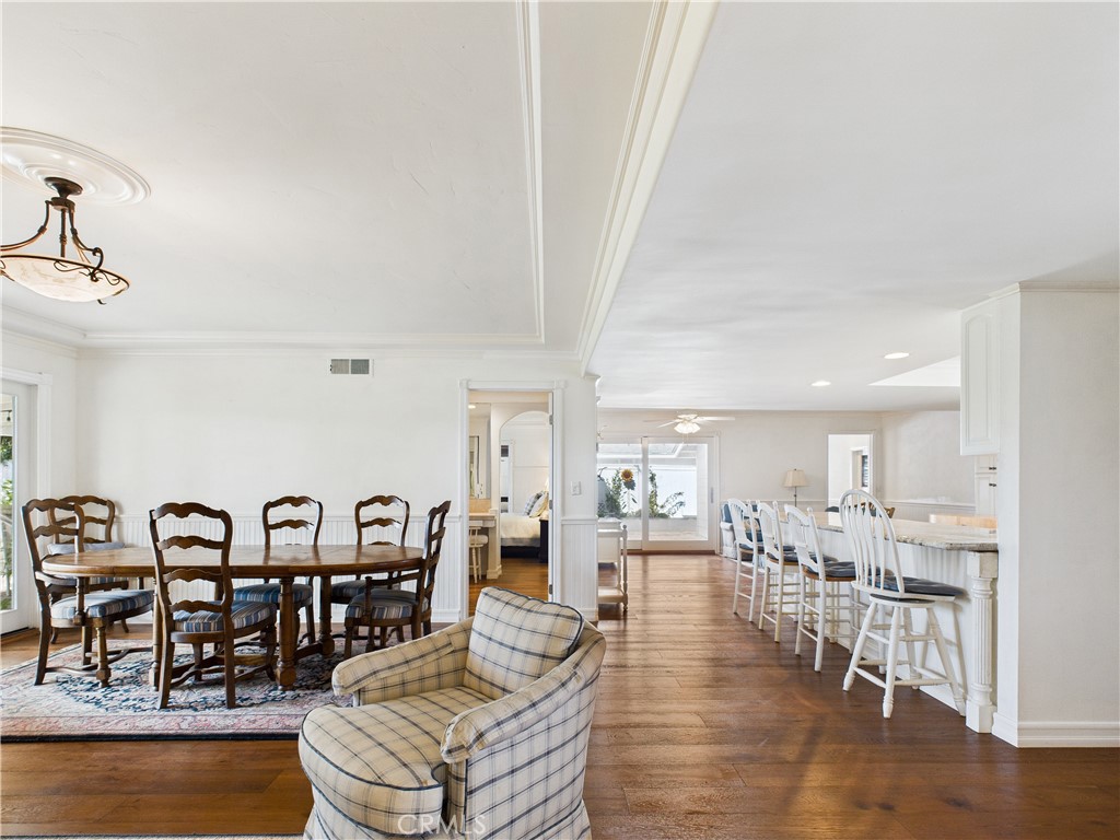 2857 Ellesmere Avenue Costa Mesa, CA 92626 - Photo 7 of 45 a living room with lots of furniture and view of kitchen