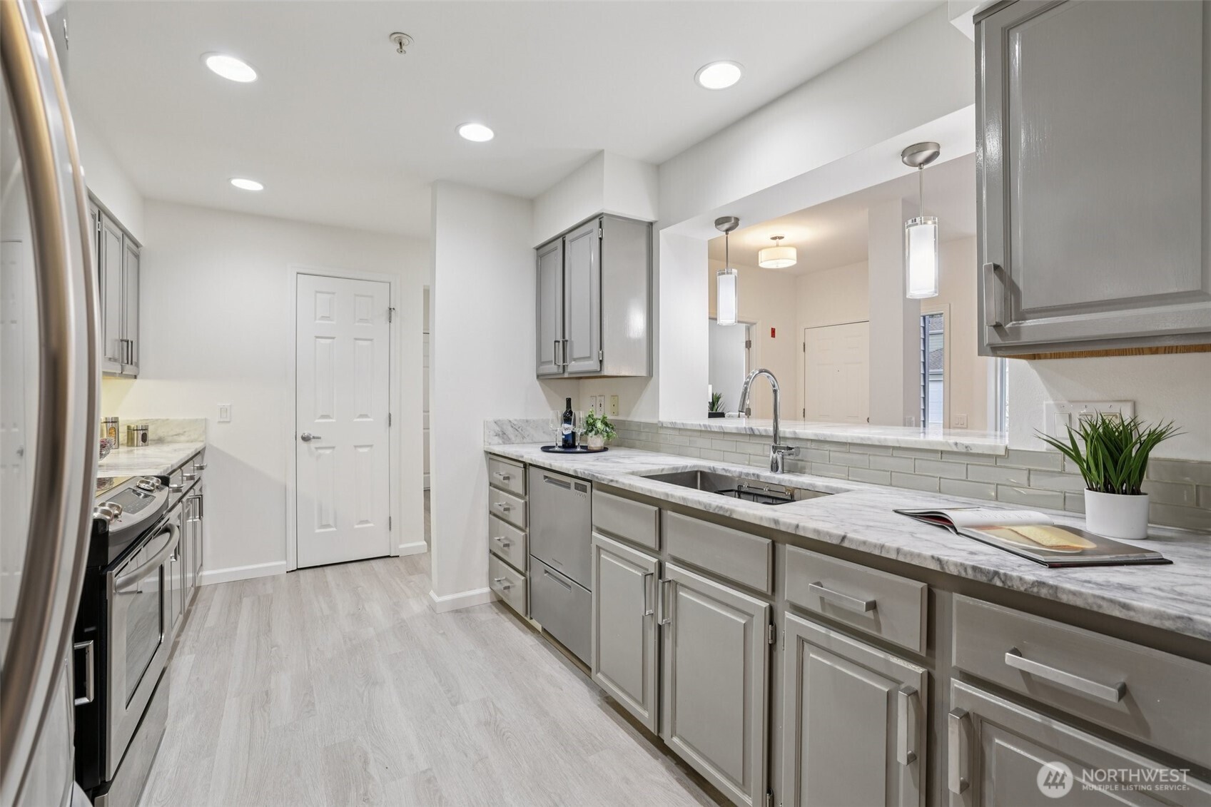 3625 224th Place Southeast Issaquah, WA 98029 - Photo 12 of 39 a spacious bathroom with a granite countertop sink a mirror and a shower