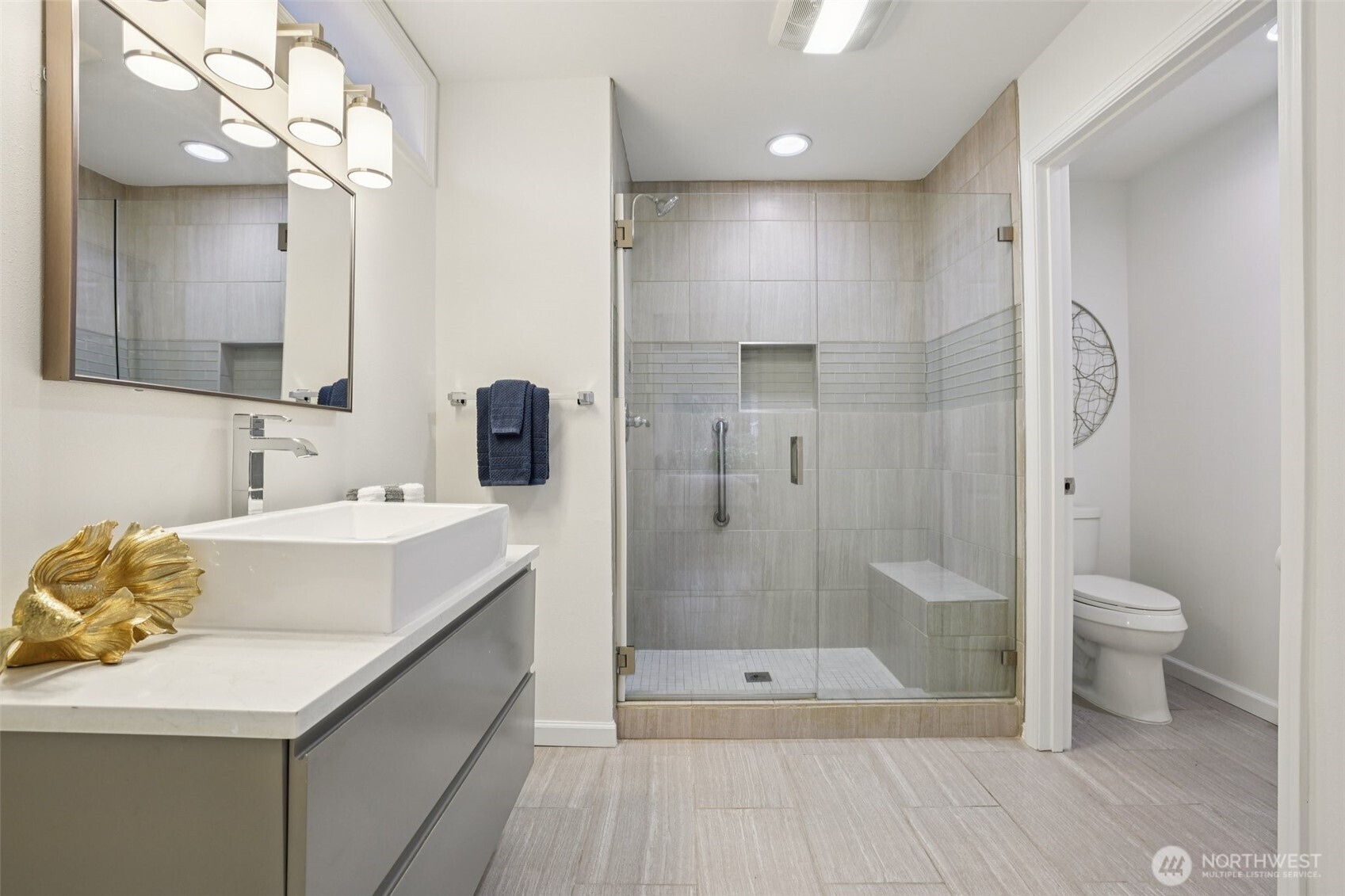 3625 224th Place Southeast Issaquah, WA 98029 - Photo 19 of 39 a bathroom with a sink a toilet and shower