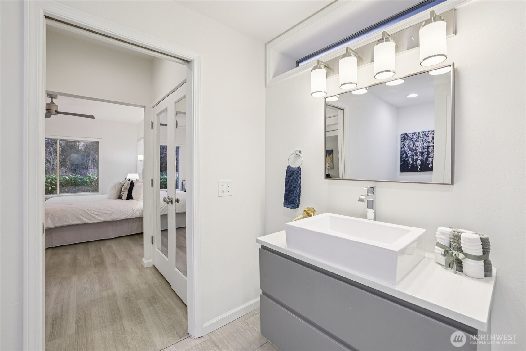 3625 224th Place Southeast Issaquah, WA 98029 - Photo 21 of 39 a en suite bathroom with a double vanity sink a mirror and shower