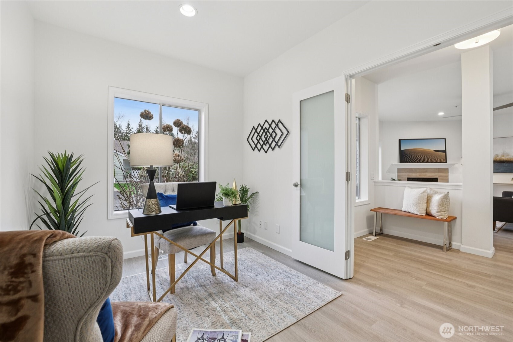 3625 224th Place Southeast Issaquah, WA 98029 - Photo 22 of 39 a work room with furniture and wooden floor