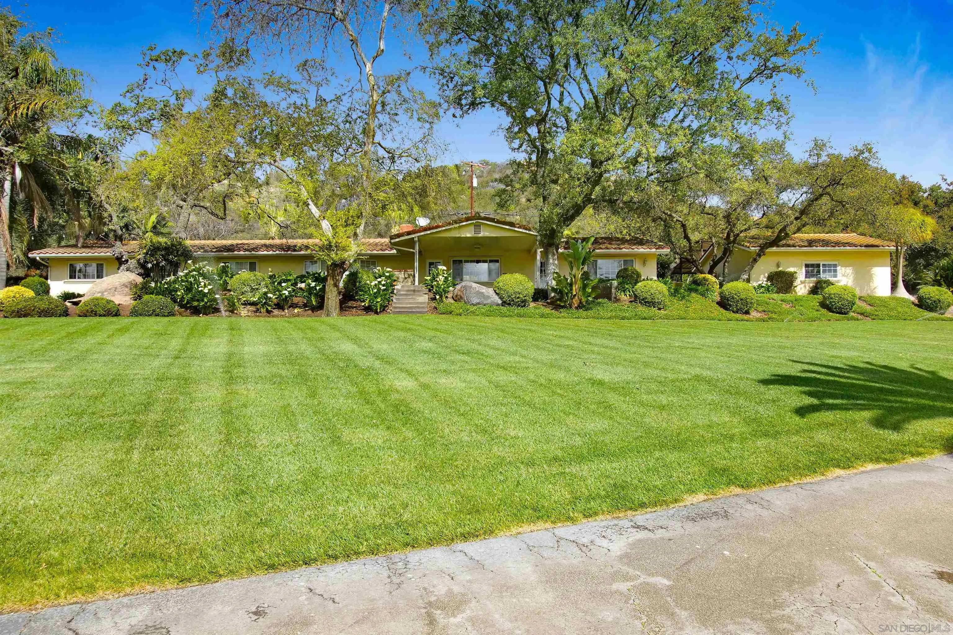 16757 Old Guejito Grade Road Escondido, CA 92027 - Photo 32 of 38 a view of an house with backyard space and garden