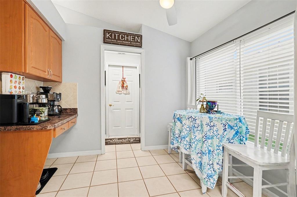11428 Dorian Court New Port Richey, FL 34654 - Photo 15 of 30 a hallway with a couch and a window