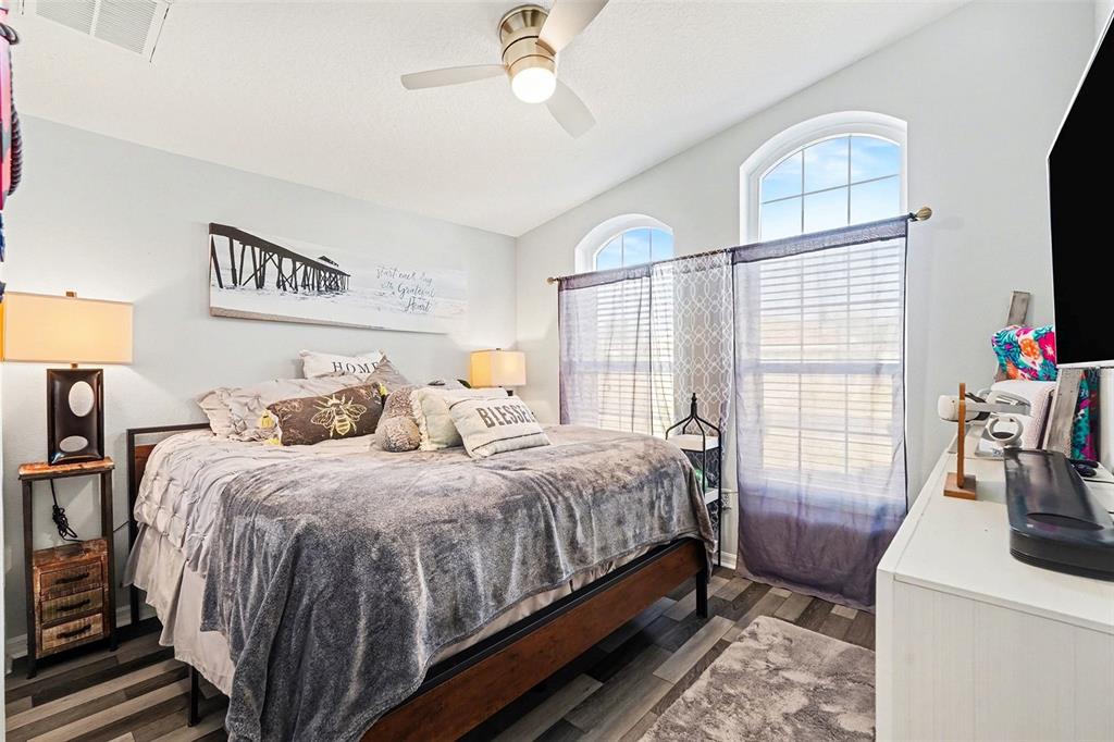 11428 Dorian Court New Port Richey, FL 34654 - Photo 24 of 30 a bedroom with double bed and a window