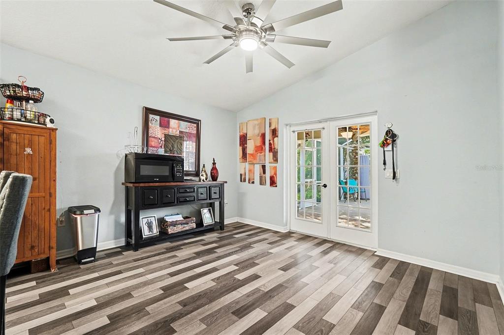 11428 Dorian Court New Port Richey, FL 34654 - Photo 10 of 30 a bedroom with furniture and a window