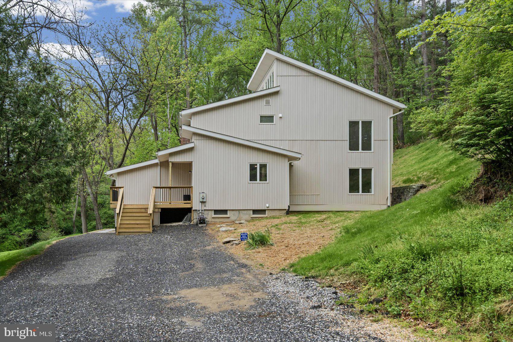 2056 Brown Road Finksburg, MD 21048 - Photo 3 of 45 Modern home nestled in lush greenery.