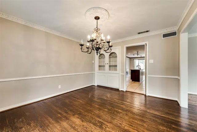 a view of a livingroom with wooden floor