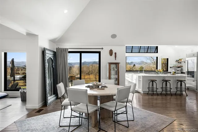 a living room with furniture fireplace and flat screen tv