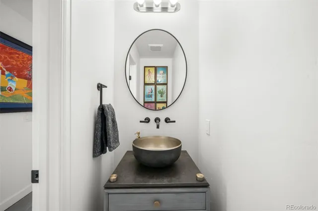 a living room with furniture flat screen tv and a fireplace