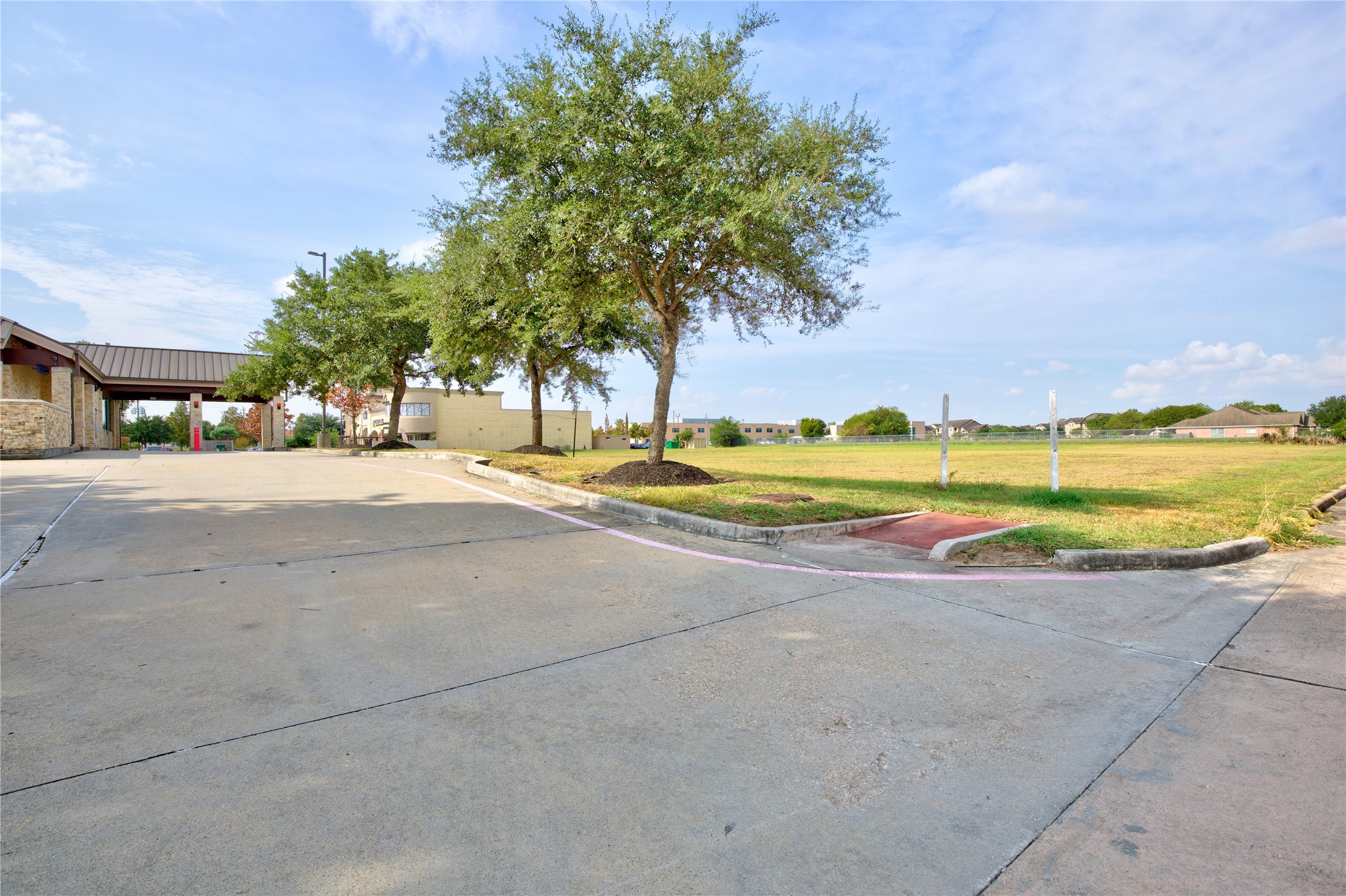 4242 Keith Road Pasadena, TX 77505 - Photo 10 of 15 a view of a street with a building in the background