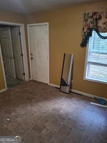 an empty room with windows